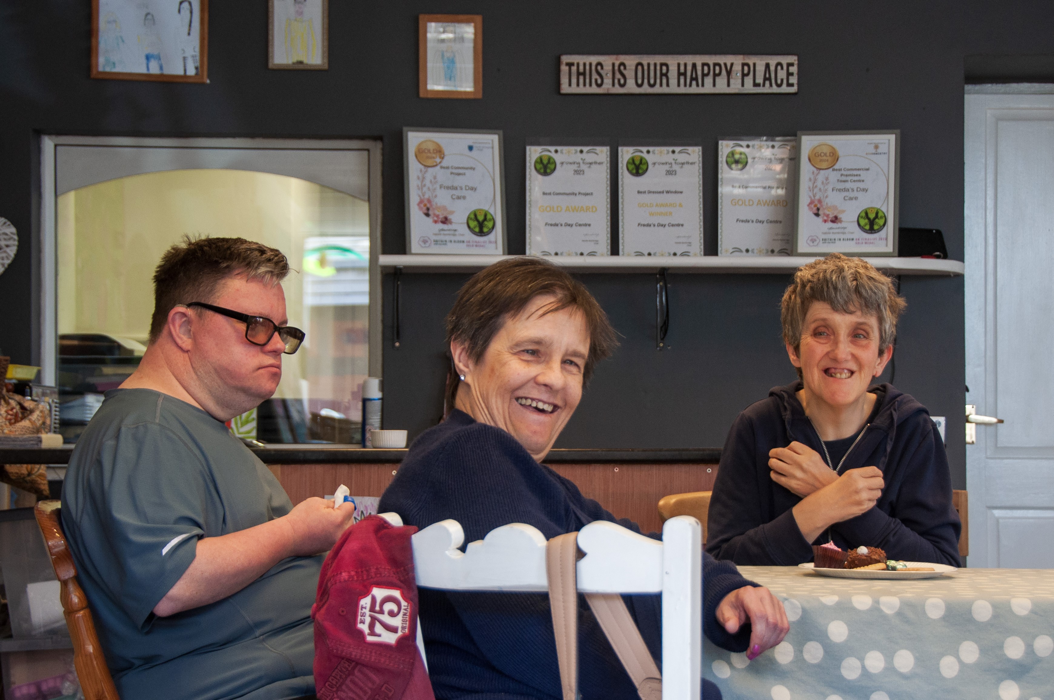 Shared Lives Coffee Morning, 3 Smiling People Around A Table