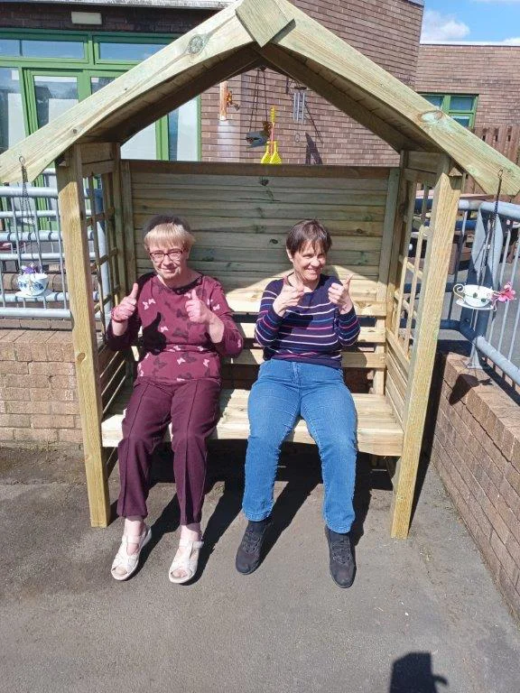 Avalon Service Users Sitting On A Bench