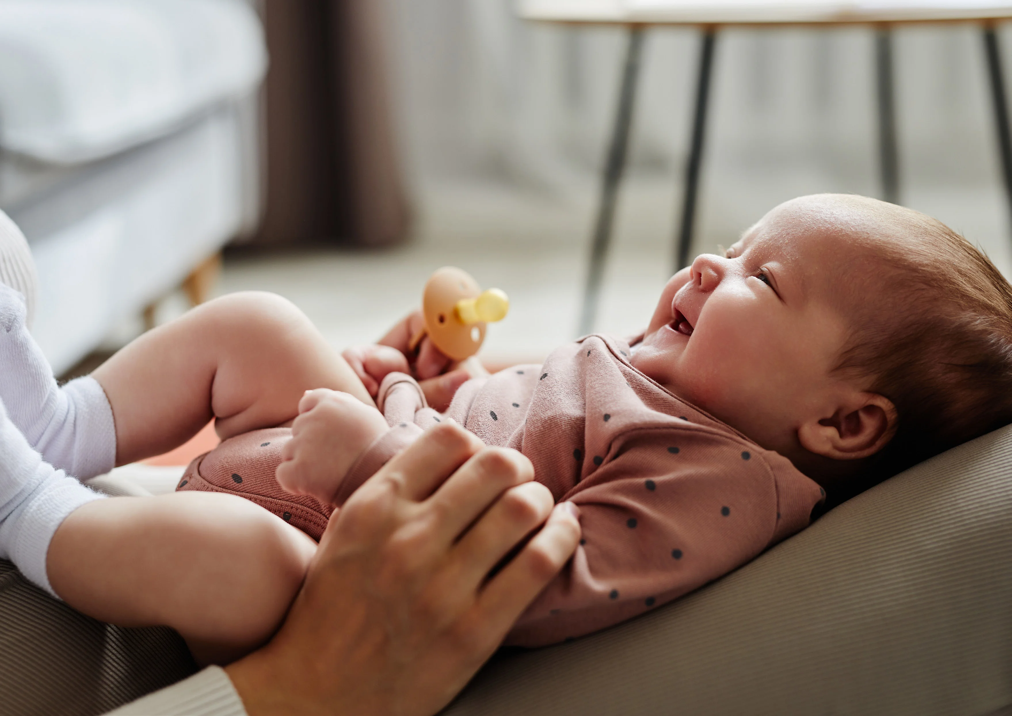 Woman Holding A Baby