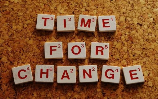 Time For Change Spelt Out In Scrabble Tiles